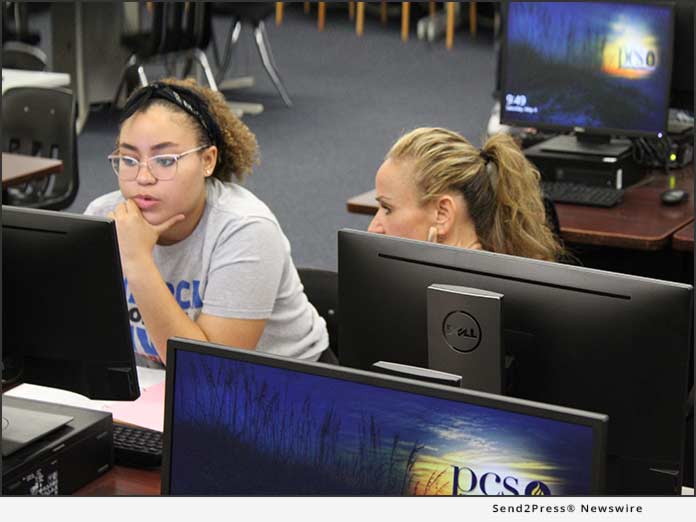 Sydney works alongside her mother at a FAFSA Completion Session