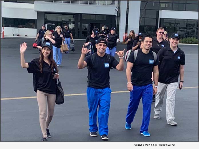 AMI Expeditionary Healthcare emergency response team boarding a flight to St. Maarten