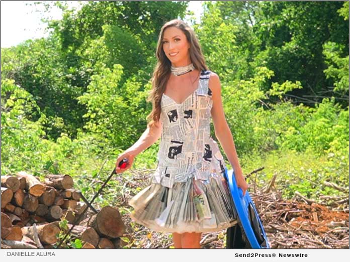 Danielle Alura wears outfit made out of newspaper