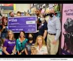 Staff from Petco and the Sacramento SPCA gathered for the check presentation at the Folsom retail store