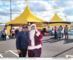 Santa and friend at the Scientology Volunteer Ministers tent in Mayfield, Kentucky