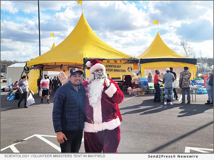 Santa and friend at the Scientology Volunteer Ministers tent in Mayfield, Kentucky