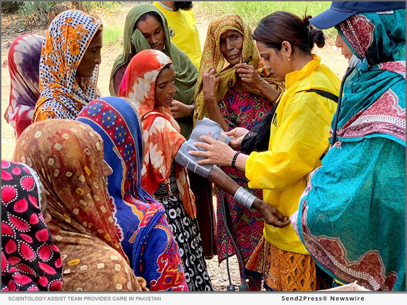 Doctor on the Scientology Assist Team provides care in a flood-damaged region of Pakistan