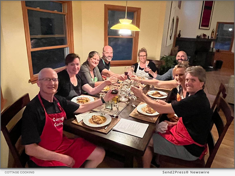 Friends reunite at offsite vacation rental for a cooking class. Cheers!