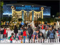 Hundreds of families help the Church of Scientology launch its annual lighting ceremony