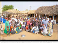 BCU Green Fund AUC Fellows join their host families for a a photo during their trip to Northern Senegal