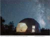 A dark night sky full of stars above a luxury Sky Dome at Clear Sky Resorts Grand Canyon