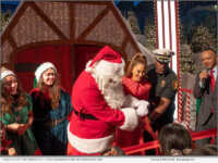 Santa cuts the ribbon at L. Ron Hubbard's Winter Wonderland