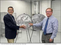 Acclaimed coin designer Joel Iskowitz (L) and American Numismatic Association President Tom Uram (R), holding the 2025 ANA Show Eagle coin.