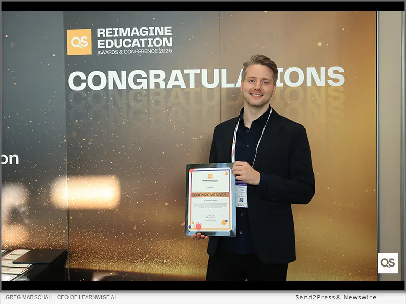 Greg Marschall, CEO of LearnWise AI, accepting the Bronze Award in the AI in Education category at the QS Reimagine Education Awards 2025