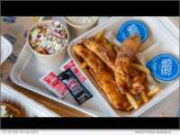 Fish and chips meal with a side of fresh slaw and clam chowder.