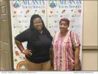 Jessica T. Moore, Clinical Director of Atlanta Youth Services (left), with Barbara Vann (right) at an Atlanta Youth Services community event.