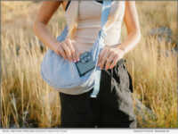 Model wearing Thread® Crescent Bag in Sky Blue
