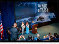 David Duong speaking to attendees at 'The King of Trash' screening at the United States Navy Memorial in Washington, D.C.