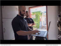 Showcases our technicians setting up an alarm monitoring system (Kord Fire Protection)