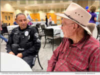 Corporal David Chavira with the La Verne Police Department talks with Hillcrest resident Jerry Davis at the First Responders Appreciation Luncheon, which honored local first responders to thank them for their service to the La Verne community.